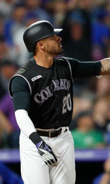 Powerful Rockies rally past Cubs, 9th straight win at home
